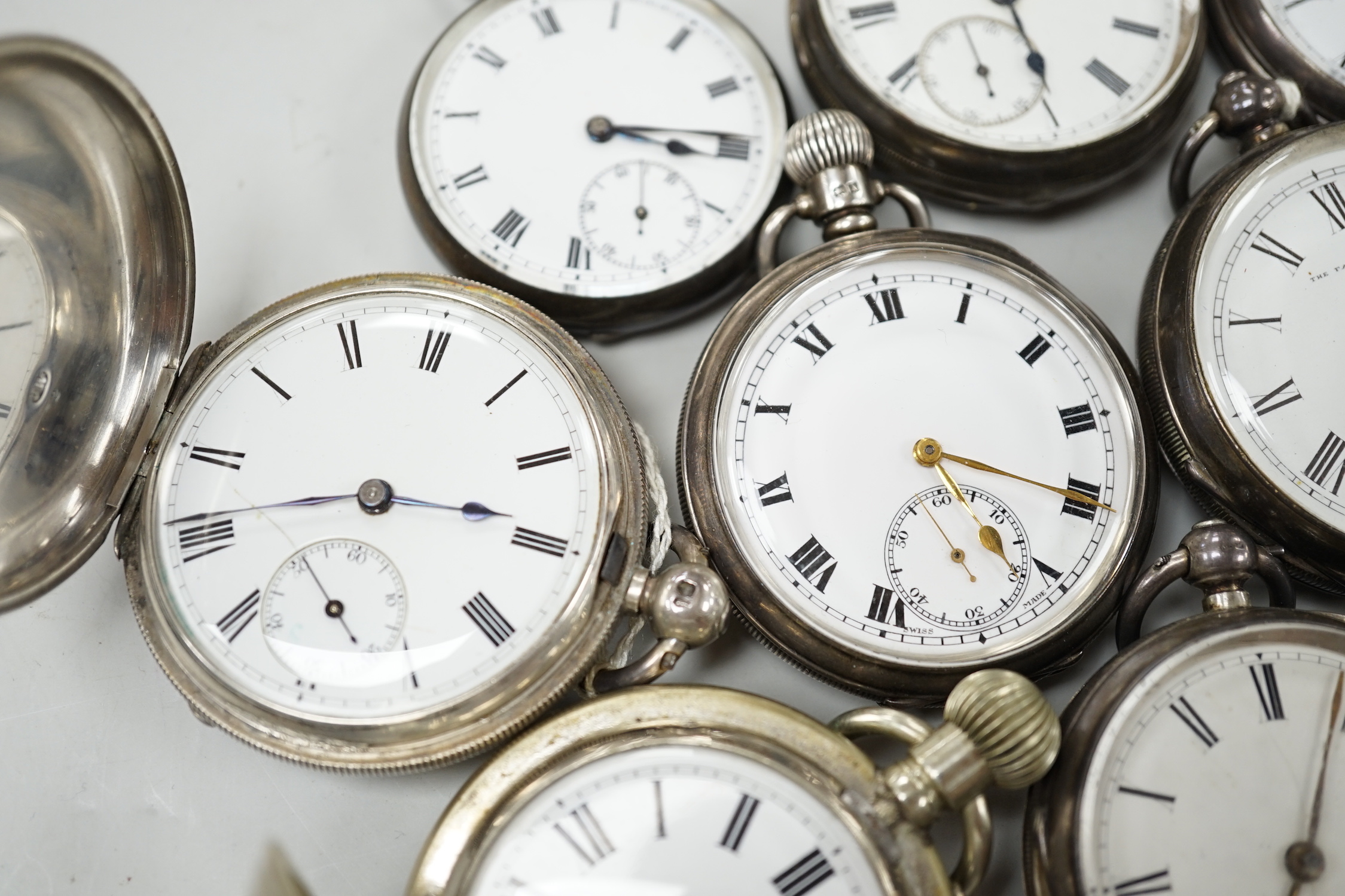 Twelve assorted mainly silver pocket watches including 'The Farringdon', Russell's and John Walker.